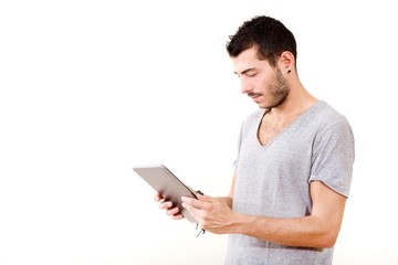 Young man using tablet