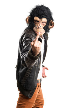 Monkey man making horn gesture