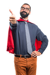Super hero  with thumb up © luismolinero