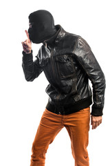 Robber making silence gesture