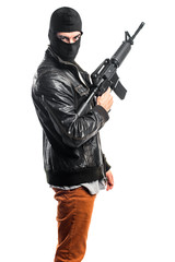 Robber holding a rifle