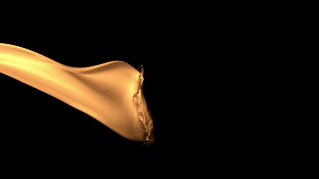 Yellow paint splash against face shooting with high speed camera, phantom flex.