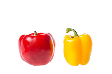colored peppers over white background