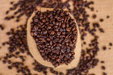 Coffee bag - coffee beans in canvas sack coffee isolated on canvas background