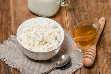 White bowl of tasty cottage cheese