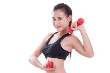 Sport woman with lifting weights and holding apple. healthy concept