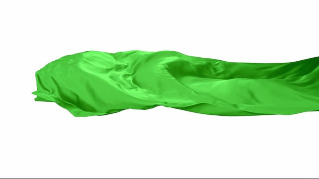 Green fabric flowing in the air on white background shooting with high speed camera, phantom flex.