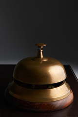Close Up Of Service Bell On Dark Background