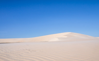 Fototapeta na wymiar Sand dunes in windy Jericoacoara, Brazil