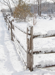 Winter Scene of a countryside farm and snow covered pasture