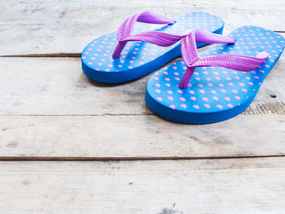 Blue flip flop with pink heart pattern