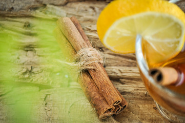 cinnamon stick next to hot wine