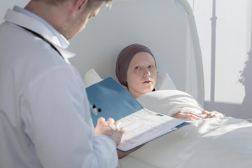 Caring doctor analyzing medical results