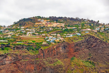 Colorful volcanic cliff coast, Madeira