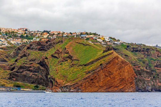 Cliff coast off town Canico, Madeira
