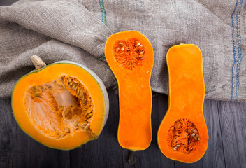 Pumpkins on wooden board