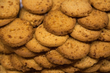 biscuits piled pyramid on Vetrin in store. French pastries.