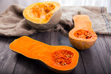 Pumpkins on wooden board