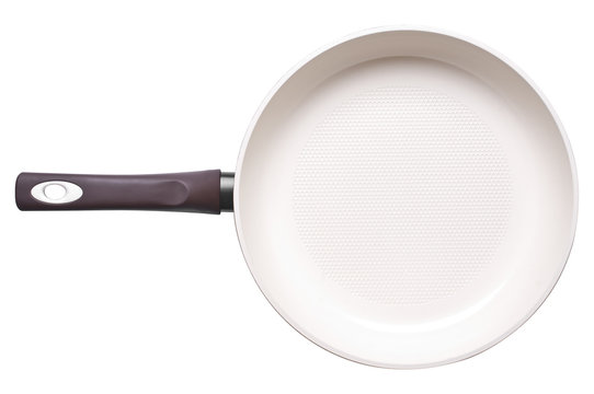 Photo of ceramic frying pan isolated on white background. Studio shot