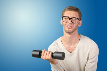 Funny weak man tries to lift a weight