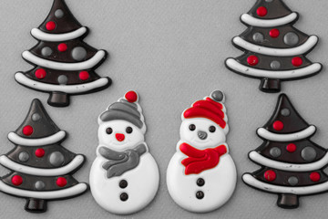 Assorted chocolate snowmen, candy trees.