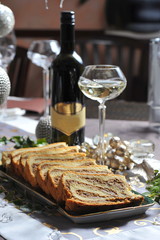 Potica/Potizza, Roll with walnuts on the festive table