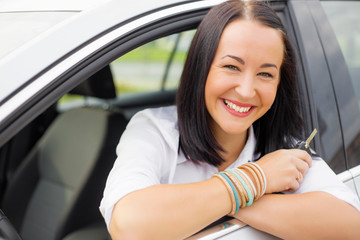 Woman with car keys in her hands