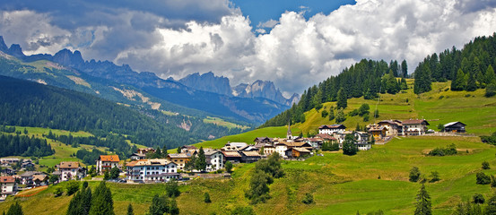 Fototapeta na wymiar view over the meadows and agriculture in the dolomite alpes, nea