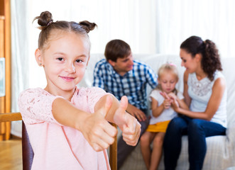 Cheerful parents with two daughters