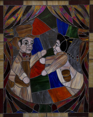 Stained glass of Two guignol fighting
