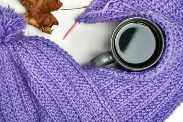 Warm cap, scarf and hot drink