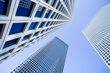 Obraz na płótnie Canvas Skyscrapers Under Blue Sky - Modern Office Building