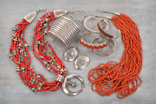A Collection of Silver, Coral and Glass Bead Native American Jewelry.