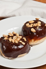  Baked Yeast Donuts with Peanuts on white plate and napkin