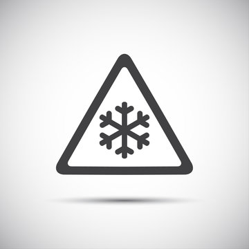 Triangular warning symbol, simple vector illustration of snowflakes