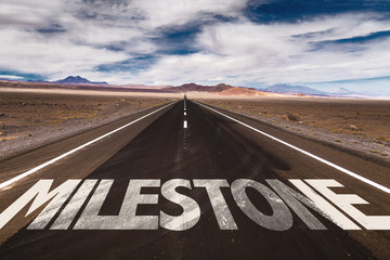 Milestone written on desert road