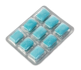 chewing gum in blister close-up on a white background