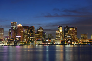 Fototapeta na wymiar Boston City Skyscrapers, Custom House and Boston Waterfront at night from East Boston, Boston, Massachusetts, USA