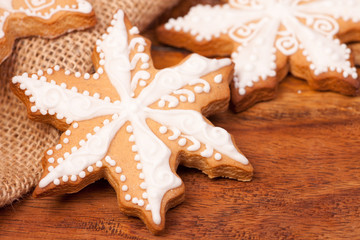 Gingerbread christmas cookies on a wooden background