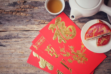 Chinese dessert with red envelope in chinese new year festival