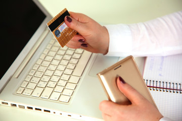 Young businesswoman working on a laptop