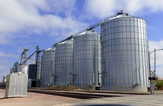 Steel grain silo on farm
