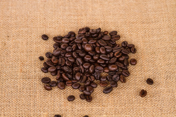 Canvas and Coffee Beans Photo Background. Copy Space