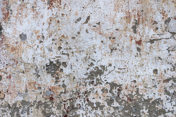 Old dirty scratched plastered wall