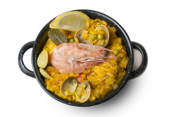 Paella small, typical Spanish rice with seafood in individual po