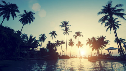 Naklejka na ściany i meble Stunning sunset on a tropical asian beach.