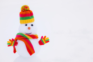 Snowman in winter park