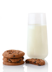 Stack of three homemade chocolate chip cookies, half of cookie and glass of milk, isolated on white background