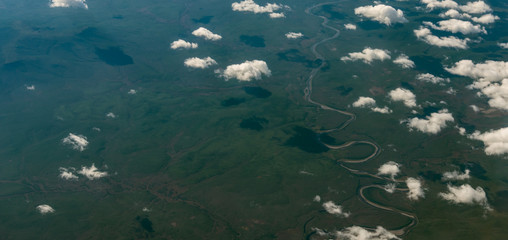 View from airplane on Earth surface.