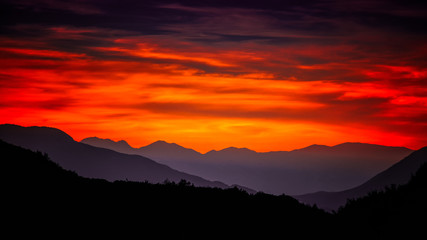 distant layered mountains at sunset